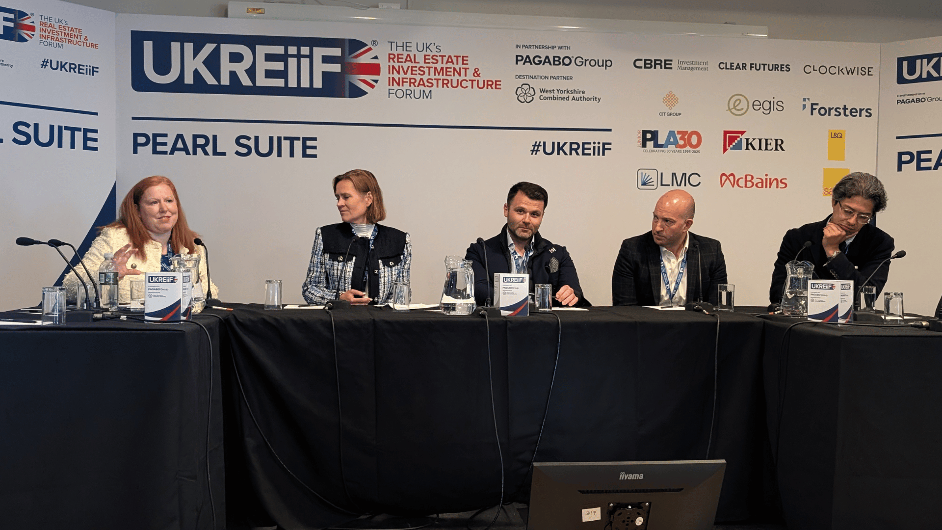 UKREiiF flex office debate panel discussing profitability, brandlords and flexible workspace strategy